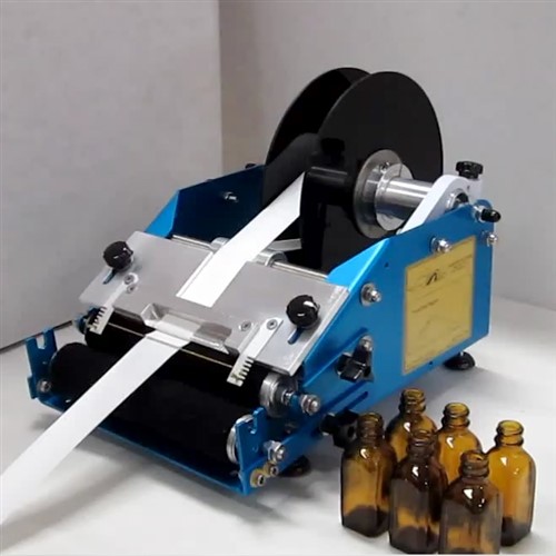 Máy dán nhãn thủ công của công ty SaintyCo Máy dán nhãn thủ công của công ty SaintyCo