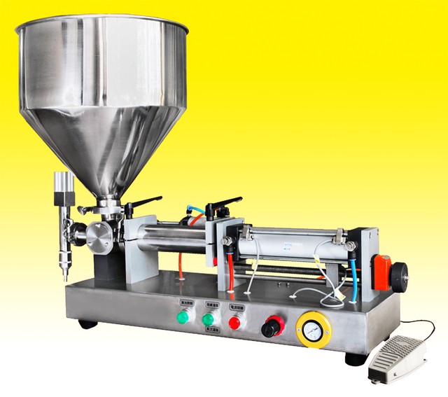 Máy chiết rót theo thể tích Máy chiết rót theo thể tích