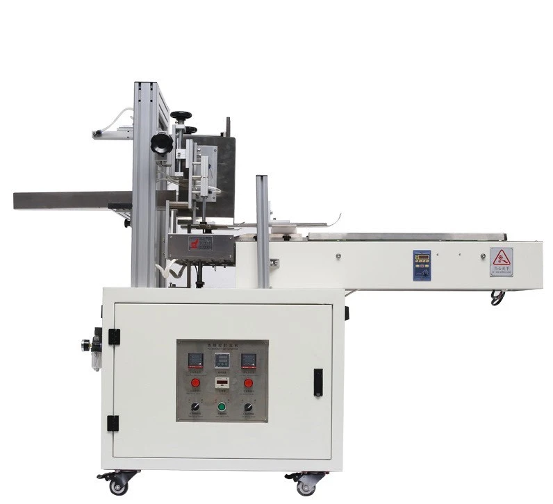 Máy dán keo nhiệt Máy dán keo nhiệt